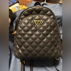 Guess backpack quilted with gold accented chain